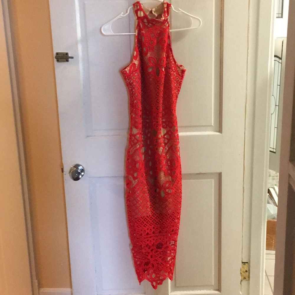 Red evening dress with tan colored inner lining.